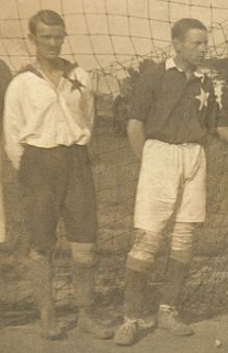Wisła Kraków reactivation after World War I would not be complete without the restoration of the White Star. Note that the goalkeeper's shirt is the reversal of normal shirt: Michał Szubert (left) wears a white shirt with a red star.